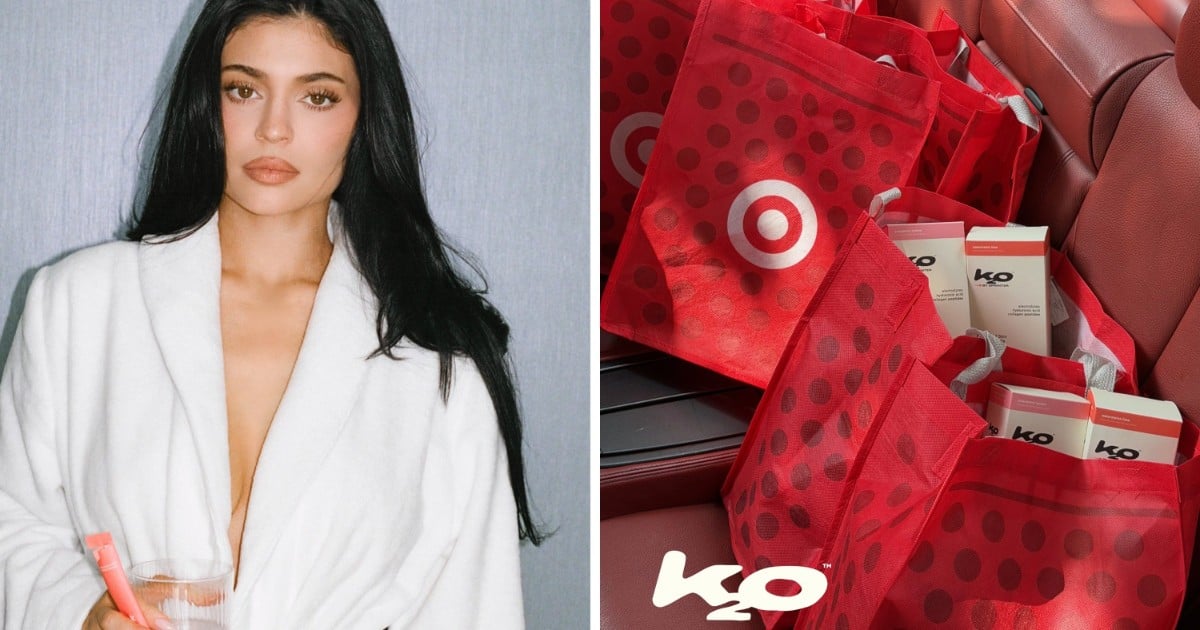 Kylie Jenner holding a k2o by Sprinter hydration stick, alongside Target bags filled with k2o boxes
