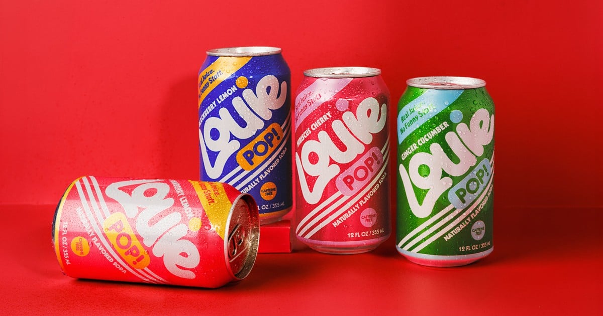 Four cans of Louie POP! soda—Blackberry Lemon, Hibiscus Cherry, Ginger Cucumber, and Strawberry Lemon—on a red background.